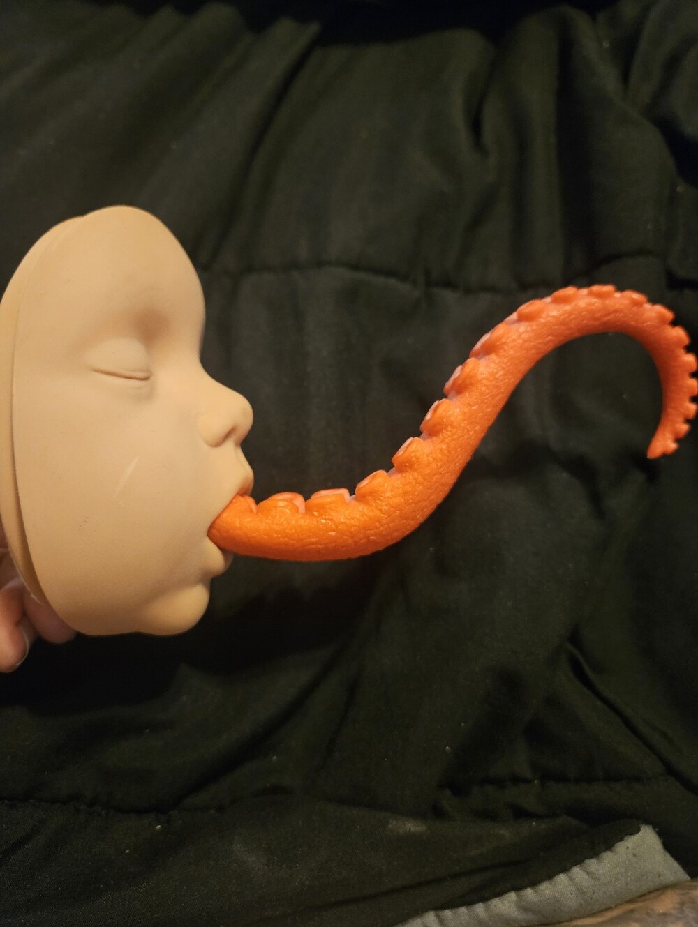 Doll Head Tentacle Art Piece